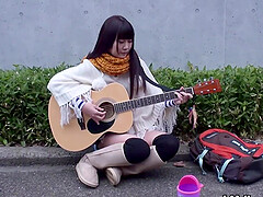 Neko is a girl of multiple talents from playing guitar to riding a cock