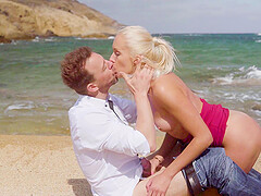 Sun's out, fun's out: Erik and angelic Angie get sandy in a steamy seaside romp