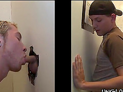 Blonde gay guy gives a gloryhole BJ to a straight cock