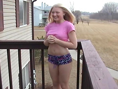 Hard teen nipples poke through her tee shirt on a cold day