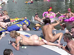 Naked chicks on the float like showing pussy to the crowd