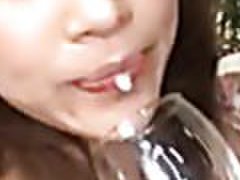 Naughty Japanese Drinks Cum From a Cup After Blowing Two Cocks in Threesome