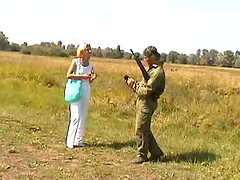 Hot blonde meets a soldier and fucks him in a field