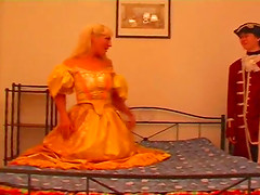 Icy hot redhead in a retro costume takes a cumshot after a hardcore humping