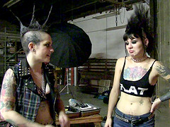 Hot punker girls with mohawks play around backstage