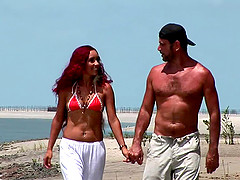 Marcia and her man take a long, romantic stroll along the beach