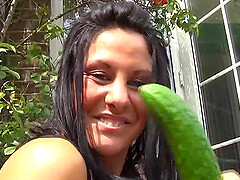 Naughty babe Crystel Lei drills her pussy with a big cucumber
