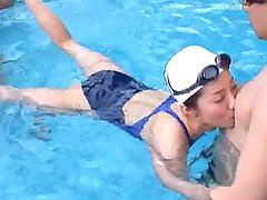Alice Miyuki gets fucked by two guys in a swimming pool