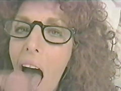 Curly Haired Brunette Wearing Glasses Does an Outstanding Blowjob
