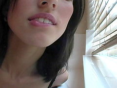 Stunning brunette honey gets flirty in close up webcam vid