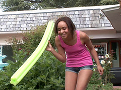 Black girl takes on two different dudes at once out by the pool