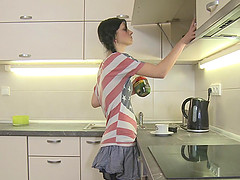 Brunette preparing breakfast then shading miniskirt for hardcore bangs