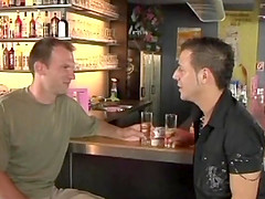Two horny guys fucking in a bar