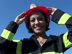 Firefighter slut lights studs fire with her hot body